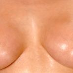 First pic of Mesmerizing Zafira reveals her shaved beaver in stockings to play with her sensitive clit.