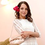 First pic of Naked chick Foxi Di is spreading legs and petting body with the tender flower