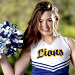 First pic of Classy cheerleaders Julia Ann and Jodi Taylor demonstrate their cute titties outdoor