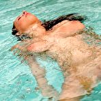 Third pic of Becky big boobs floating in the pool (FTV Girls)