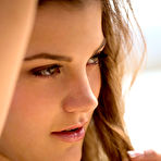 Second pic of 
      Aubrey Snow pleasuring her bald pussy on the sofa
    