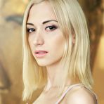 First pic of Shaved blonde beauty Anna Lee teases with her skinny ass and tight pussy on a big bed.