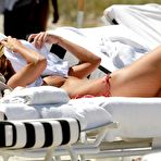 First pic of Beatrice Trezeguet caught topless on the beach