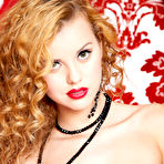 Second pic of Jessie Rogers spreads her moist pussy lips in the boudoir