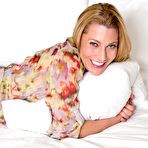 First pic of The seducing big titted milf Jennifer Best takes panty off and shows shaved pussy slit