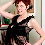 First pic of 
      Busty redhead RyAnne in black lingerie at All Natural Cuties
 
