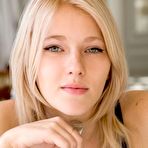 First pic of Mesmerizing blonde Mila I rolls around in her bed showing off her shaved pussy in a long dress.