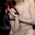 First pic of Charming teen Loretta A shows her shaved pussy and touches herself naughtily.