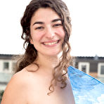 Fourth pic of Naturally busty girl Livia teasing outdoors in the rain at PinkWorld Blog