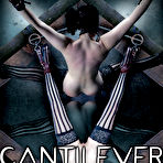 First pic of SexPreviews - Endza Adair in stripped stockings is bound to wooden device pussy toyed and spread