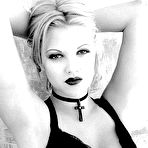 First pic of Drew Barrymore posing for Guess Jeans Ads shows nipple slip