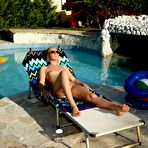 Third pic of Mouth watering pussy fisting scene with Angie Koks and Cayenne Klein by the swimming pool