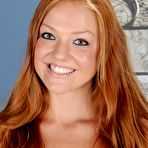 First pic of Redhead gadget Farrah Flower is spreading her delicious tan lined body before cam