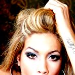 Fourth pic of Latina Isis Taylor rubs dick between boobs, then takes it in mouth until the explosion