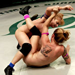 Third pic of Bella Wilde and Lea Lexis are half naked on the floor while wrestling in kinky cat fights.
