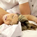 Fourth pic of Gina Gerson does her morning stretches in front of a backlit screen, and then finds Kristof Cale asleep and unable to appreciate her teasing moves.