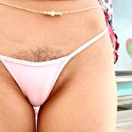 Second pic of Teen babe Marley Brinx is lying on couch and widely opening her long sexy legs and showing cute pussy 