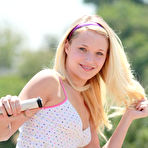 First pic of Playful blonde haired teenage chick Teagan Summers strips naked in the garden