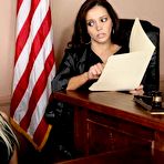 Third pic of Blonde Carolyn Reese in black stockings and pink panties gets spanked by brunette judge