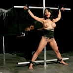 Second pic of Master Liam ties busty Gianna Lynn to wheel-chair and then toys her helpless slit