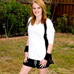 First pic of Red-haired soccer girl Katey Grind strips in the field and gives a close-up of her shaved snatch