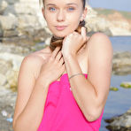 Fourth pic of Wearing a sexy leather dress and boots Milena displays her petite and nubile body on top of a motorcycle