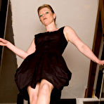 First pic of British hottie Holly Kiss shows off her back seam nylons and peels off retro silkies on the stairs