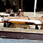 Fourth pic of Karen Mulder relaxing topless on the beach