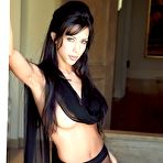 First pic of Raunchy brunette Linda in black pantyhose posturing topless on camera taking hot seductive poses.