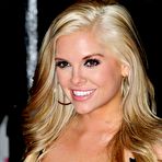 Fourth pic of Kayla Collins sexy at Burlesque premiere shows deep cleavage and legs