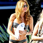 Fourth pic of Kelly Bensimon caught in black bikini on the beach in Miami