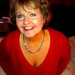 Second pic of Busty Bliss - Hot busty cougar poses in her red sweater and panties