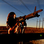 Third pic of Mya: Posing with toy guns @ Action Girls - XNSFW.COM