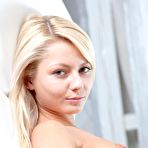 Third pic of Enchanting blonde babe Pinky June peels off her sexy lingerie and poses nude