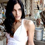First pic of Kinky brunette girl Megan C stripping and sitting with her nude body ready for admiration