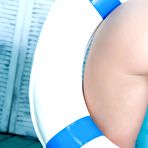 Second pic of Sweet teen Evita Lima possesses wonderful big melons and nicely shaved beaver