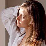 First pic of Superb softcore model Rene Star strips her white panties and button up shirt to pose naked.