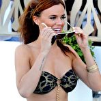 Fourth pic of Busty Maria Fowler shows deep cleavage on the beach in Spain