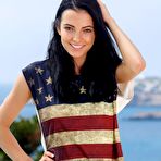 First pic of Sweet and sexy brunette Sapphira A is taking off her US flag swimsuit and bending hot to show tight pussy