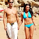 First pic of British popstar Michelle Heaton caught in sexy bikini on a beach with honey