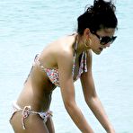 First pic of Busty Michelle Keegan shows cleavage on the beach in St.Lucia