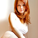 First pic of Smoldering hot redhead babe Mia Sollis shows off her shaved soft pussy for camera