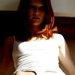 Second pic of Smoldering hot redhead babe Mia Sollis shows off her shaved soft pussy for camera