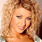 First pic of Saucy pornstar Tea in short dress and hot lacy lingerie stripping and playing with vibrator.