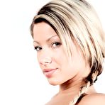 Second pic of Horny blonde Tea Jul willingly shows all the beauty of her smooth naked body