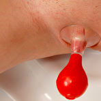 Third pic of See Melany suck up  her already swollen clit with a nipple pump
