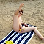 Third pic of Brunette girl Judy Smile is outdoor demonstrating hot masturbation with banana