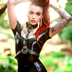 First pic of 
      Leigh Raven peels off her skintight shiny latex dress
    