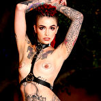 Third pic of 
      Leigh Raven peels off her skintight shiny latex dress
    