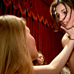 Second pic of Odile in painful looking bondage with her tended boobs pegged and wet puss stimulated.